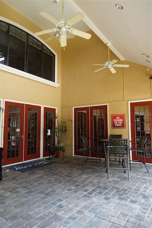 view of patio / terrace featuring ceiling fan and french doors