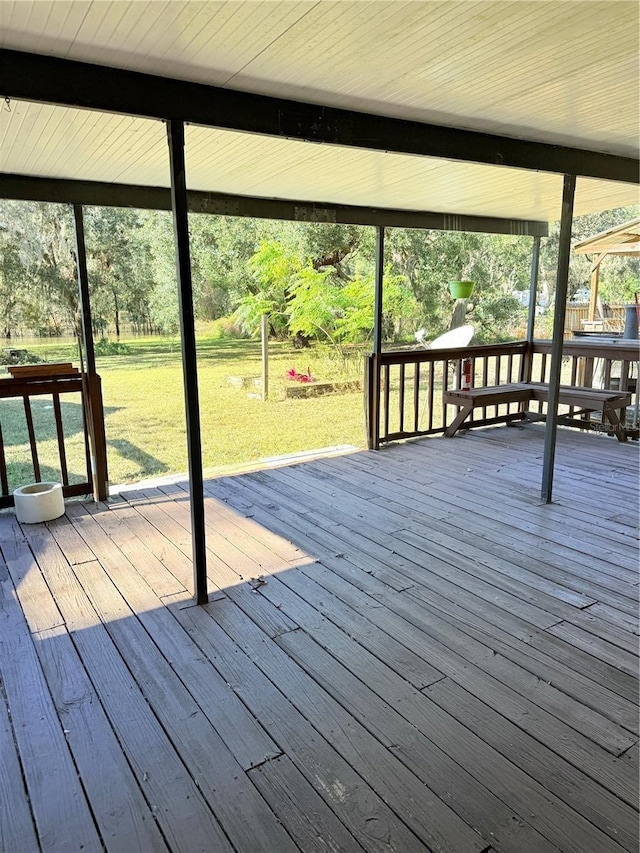 wooden deck with a yard