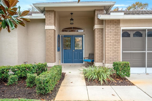 property entrance featuring french doors