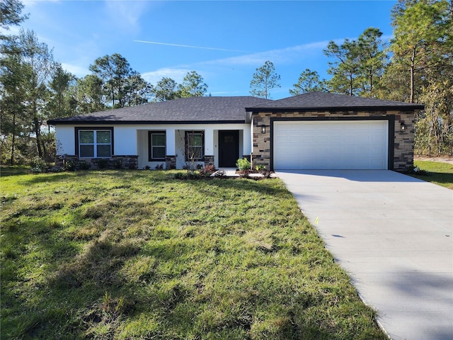 view of front facade with a front lawn and a garage