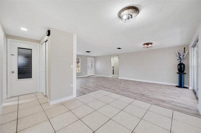 interior space with light tile patterned floors