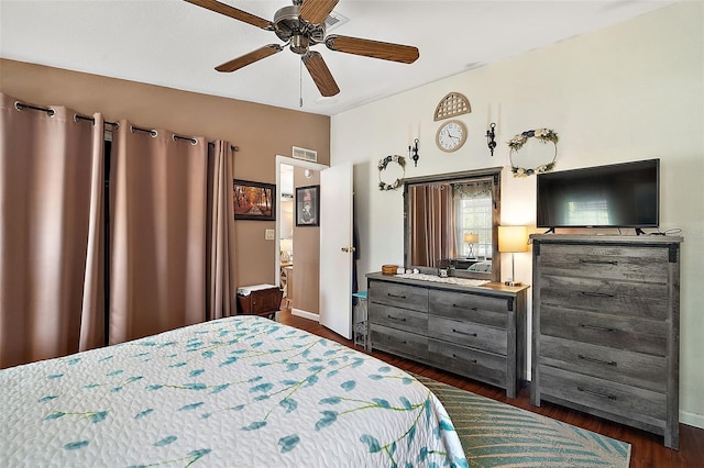 bedroom featuring ceiling fan and dark hardwood / wood-style floors