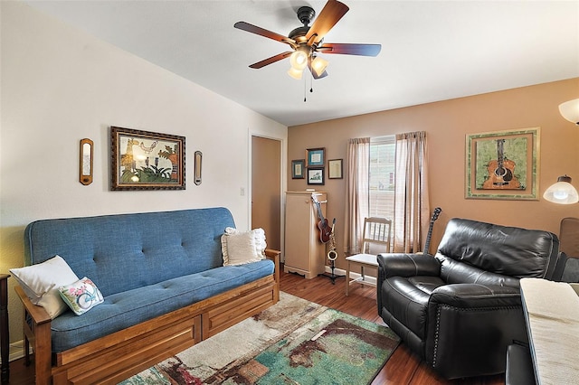 living room with dark hardwood / wood-style floors and ceiling fan