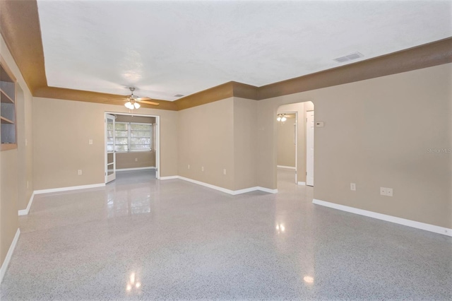 spare room with ceiling fan