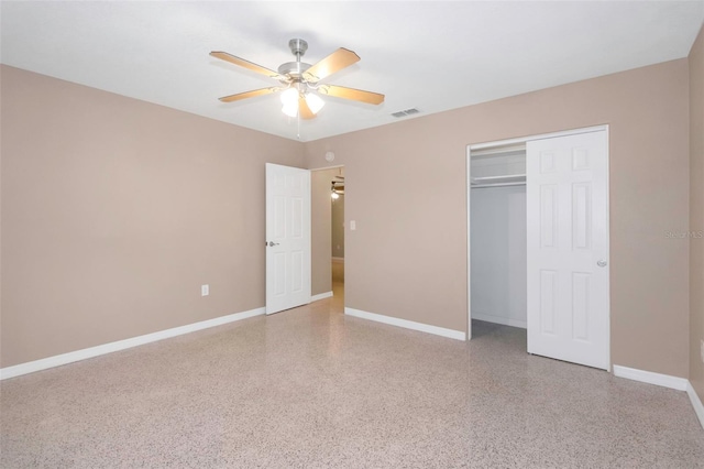 unfurnished bedroom with a closet and ceiling fan