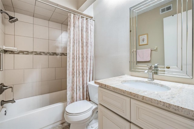 full bathroom with shower / bath combo with shower curtain, vanity, and toilet