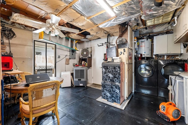 below grade area featuring independent washer and dryer, electric water heater, and a ceiling fan