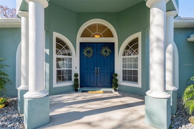 entrance to property with a porch