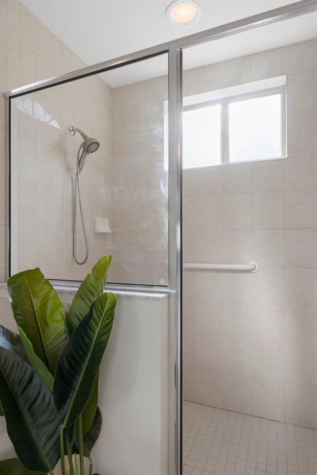 bathroom featuring an enclosed shower