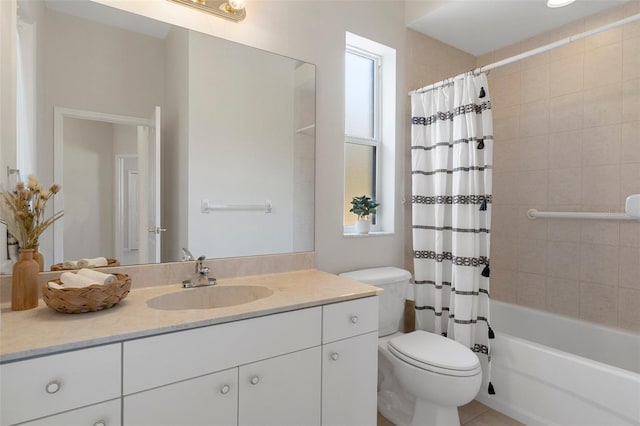 full bathroom featuring vanity, tile patterned flooring, toilet, and shower / bathtub combination with curtain