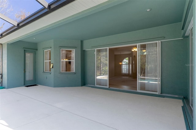 view of patio with a lanai