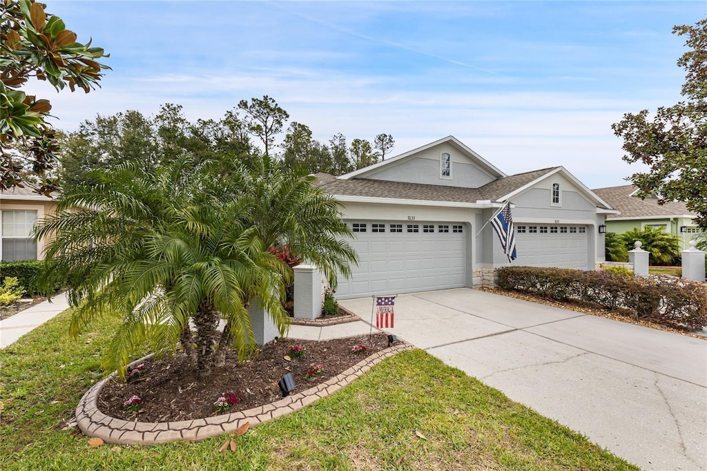 single story home with a garage