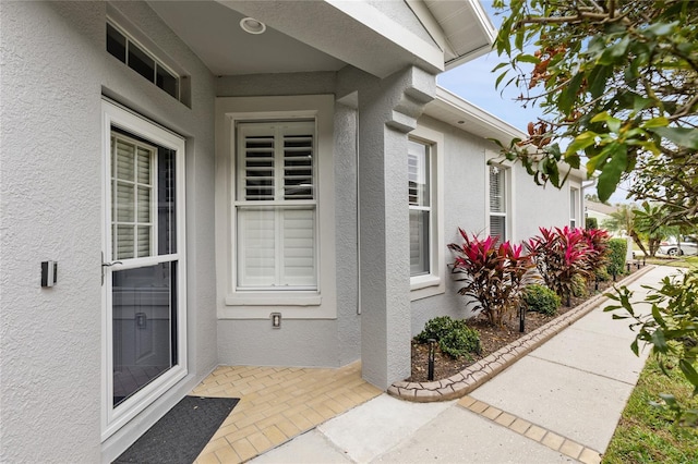 doorway to property featuring a patio area