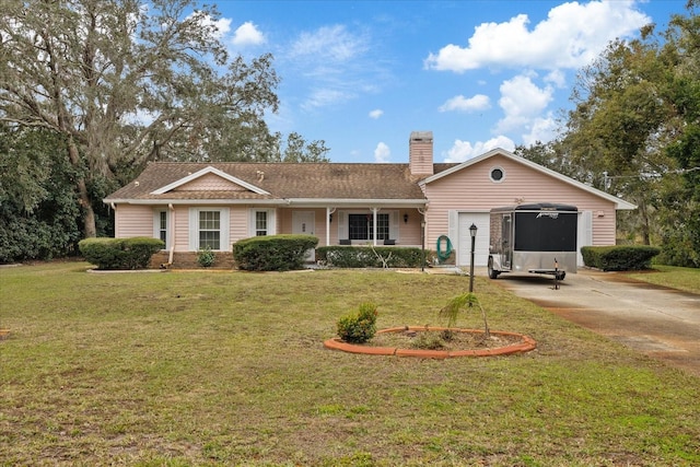 ranch-style home featuring a front lawn