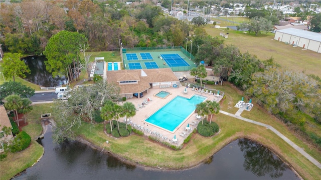 birds eye view of property featuring a water view