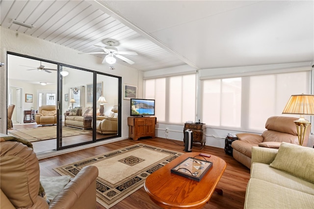 living room with hardwood / wood-style floors and ceiling fan