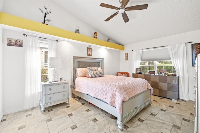 bedroom featuring vaulted ceiling and ceiling fan