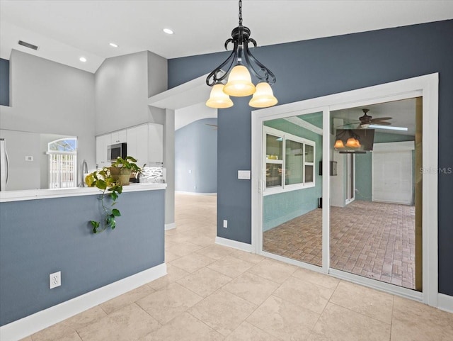 interior space featuring sink, high vaulted ceiling, and ceiling fan