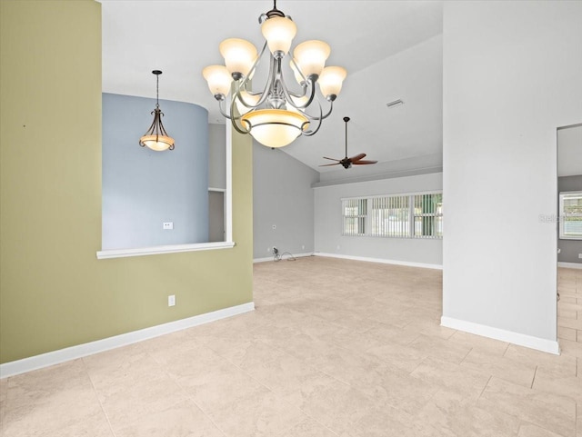 empty room with vaulted ceiling and ceiling fan with notable chandelier