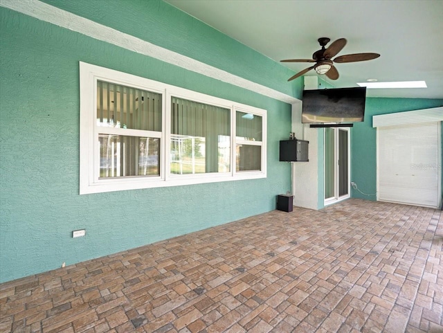 view of patio / terrace with ceiling fan