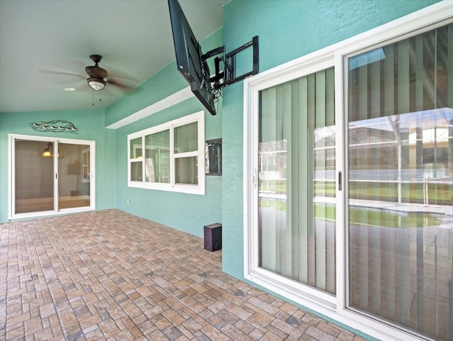 view of patio / terrace featuring ceiling fan