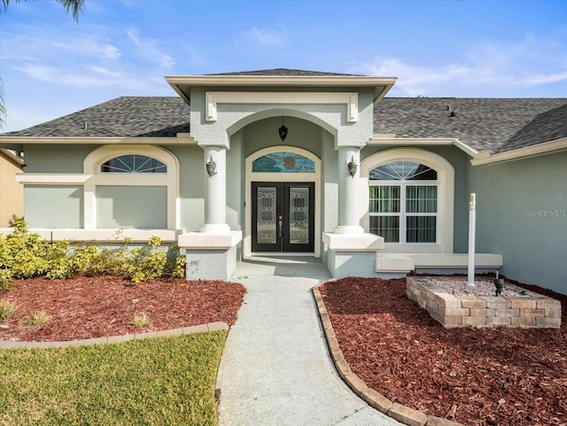 view of exterior entry with french doors