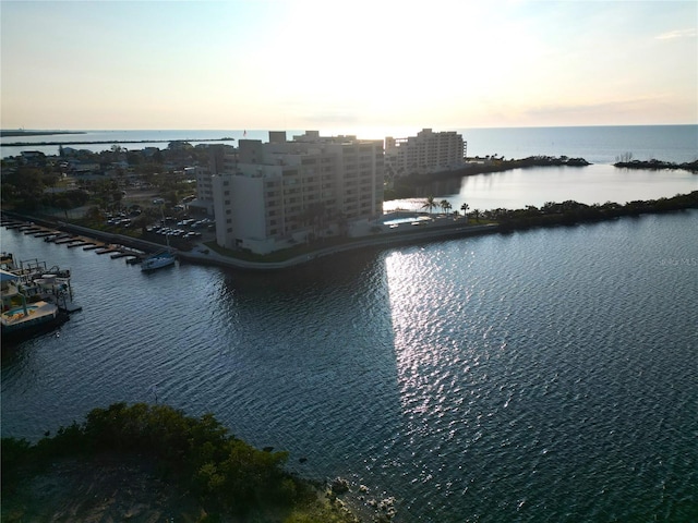 aerial view at dusk with a water view