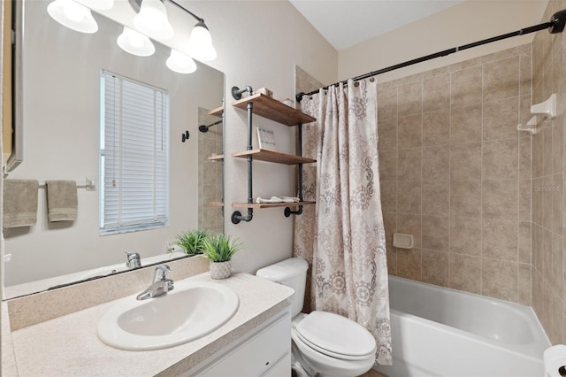 full bathroom featuring shower / tub combo with curtain, vanity, and toilet