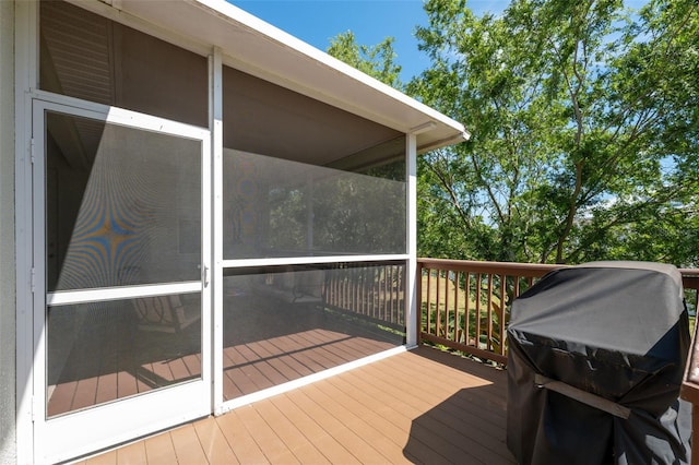 wooden terrace with area for grilling