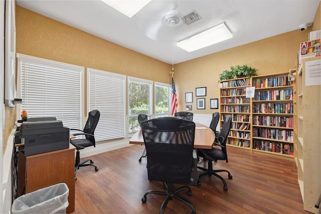 office space featuring ceiling fan and dark wood-type flooring