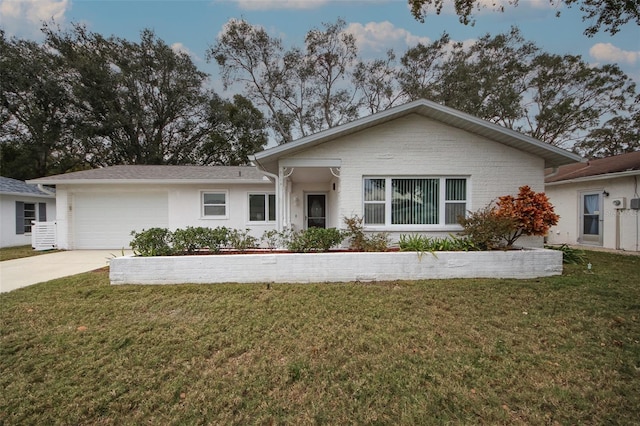 ranch-style house with a front yard and a garage