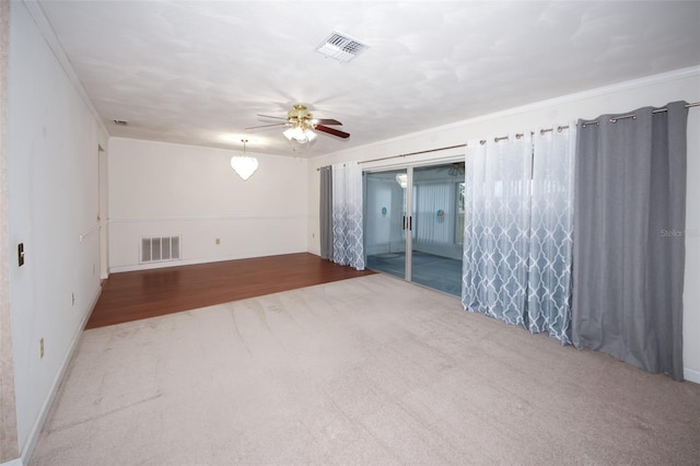 unfurnished room with hardwood / wood-style floors, ceiling fan, and ornamental molding