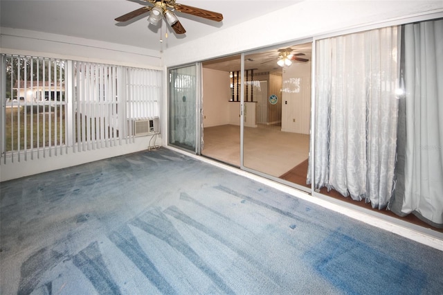 spare room with a notable chandelier and carpet floors