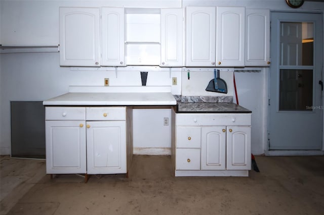 kitchen featuring white cabinetry