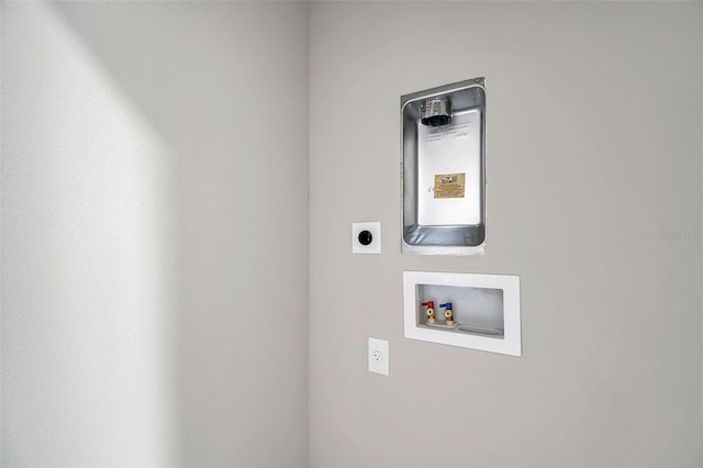 washroom featuring hookup for an electric dryer and washer hookup