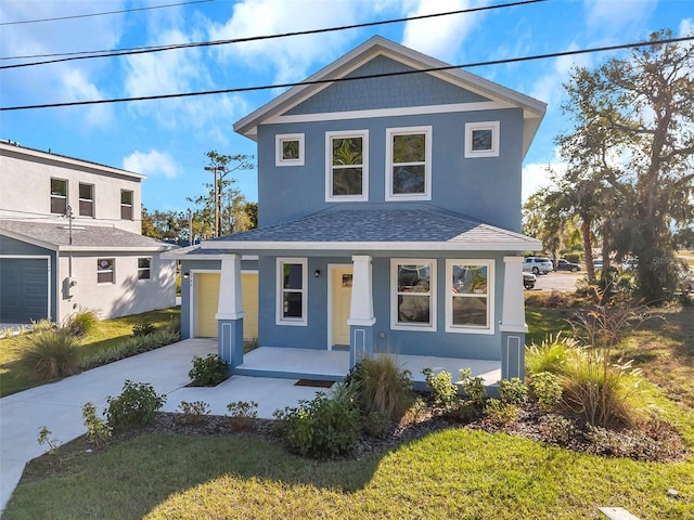 view of front of property with a front yard and a porch