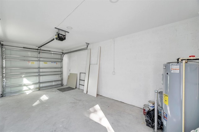 garage with a garage door opener and water heater