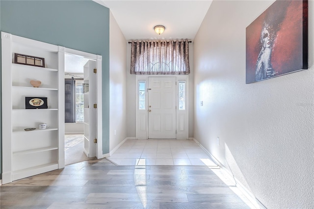 entrance foyer with light hardwood / wood-style floors