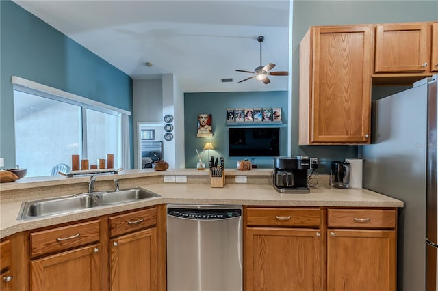 kitchen with ceiling fan, sink, and stainless steel appliances