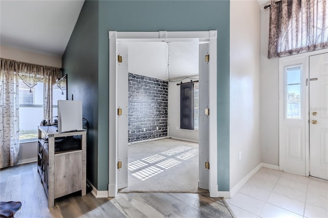 foyer entrance featuring light tile patterned floors