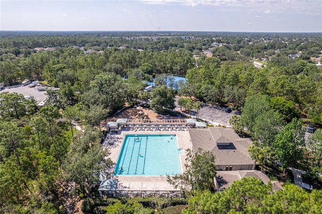 13793 Dunwoody Dr, Spring Hill, FL 34609 - drone / aerial view of a heavily wooded area and a pool