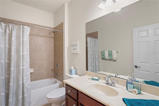 full bathroom with toilet, vanity, and shower / bath combo