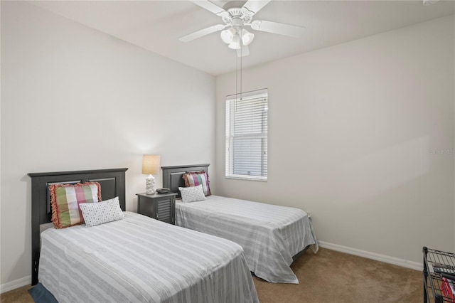 bedroom featuring ceiling fan and carpet floors