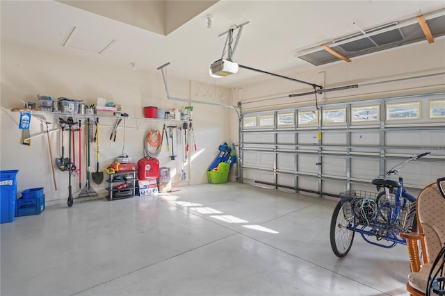 garage featuring a garage door opener