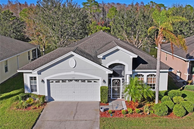 view of front of property featuring a garage