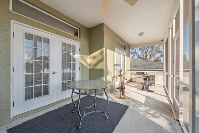 sunroom featuring french doors