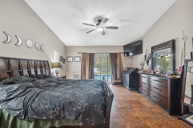 bedroom with a textured ceiling, vaulted ceiling, tile patterned flooring, ceiling fan, and access to exterior