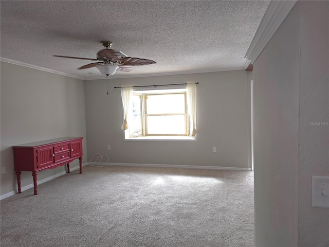 unfurnished room with light carpet, a textured ceiling, ceiling fan, and crown molding