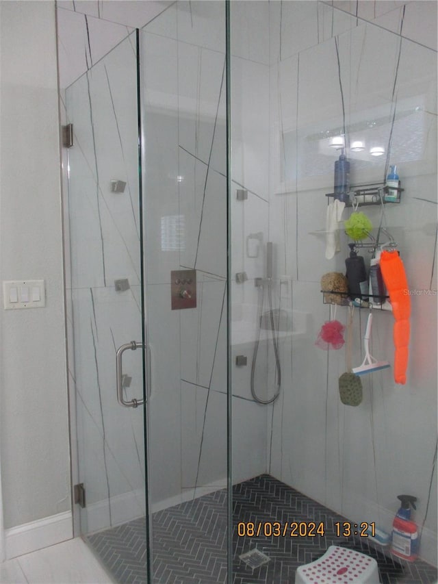 bathroom featuring walk in shower