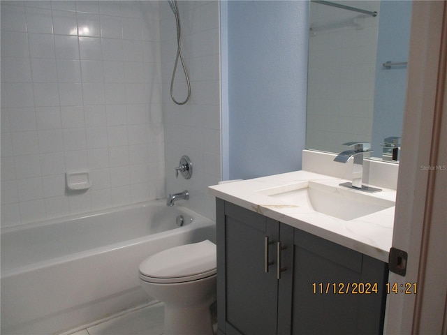 full bathroom with vanity, toilet, and shower / tub combination